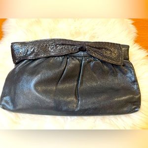 Vintage 80’s Sylvia Cee black leather clutch handbag. Great pre loved condition.